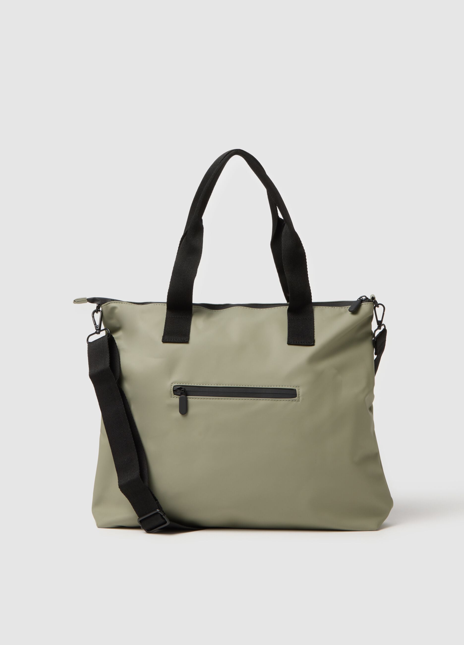 Green tote bag with multiple compartments and adjustable shoulder strap