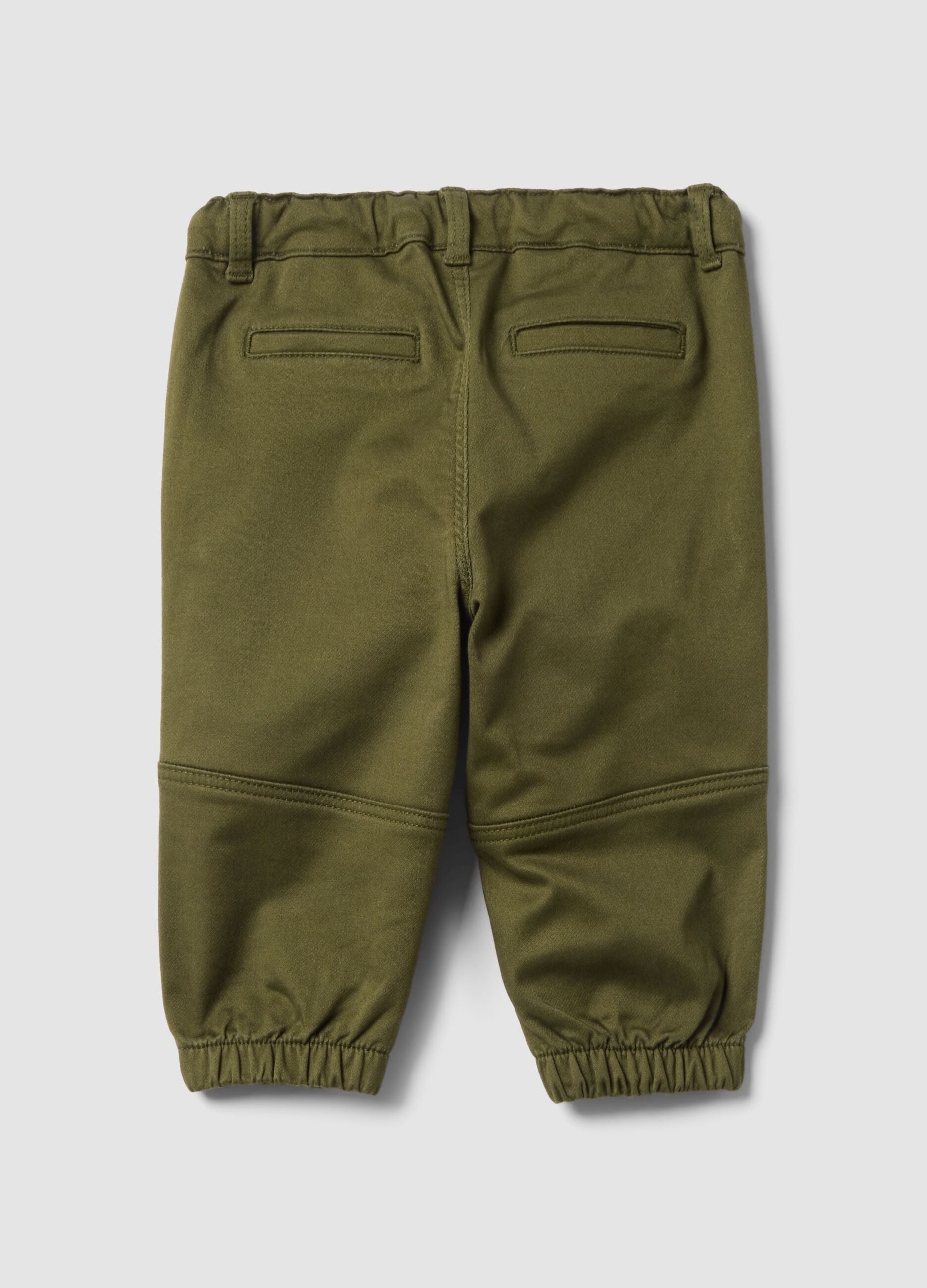 Green stretch cotton jogger trousers with drawstring, oversized fit for baby boy