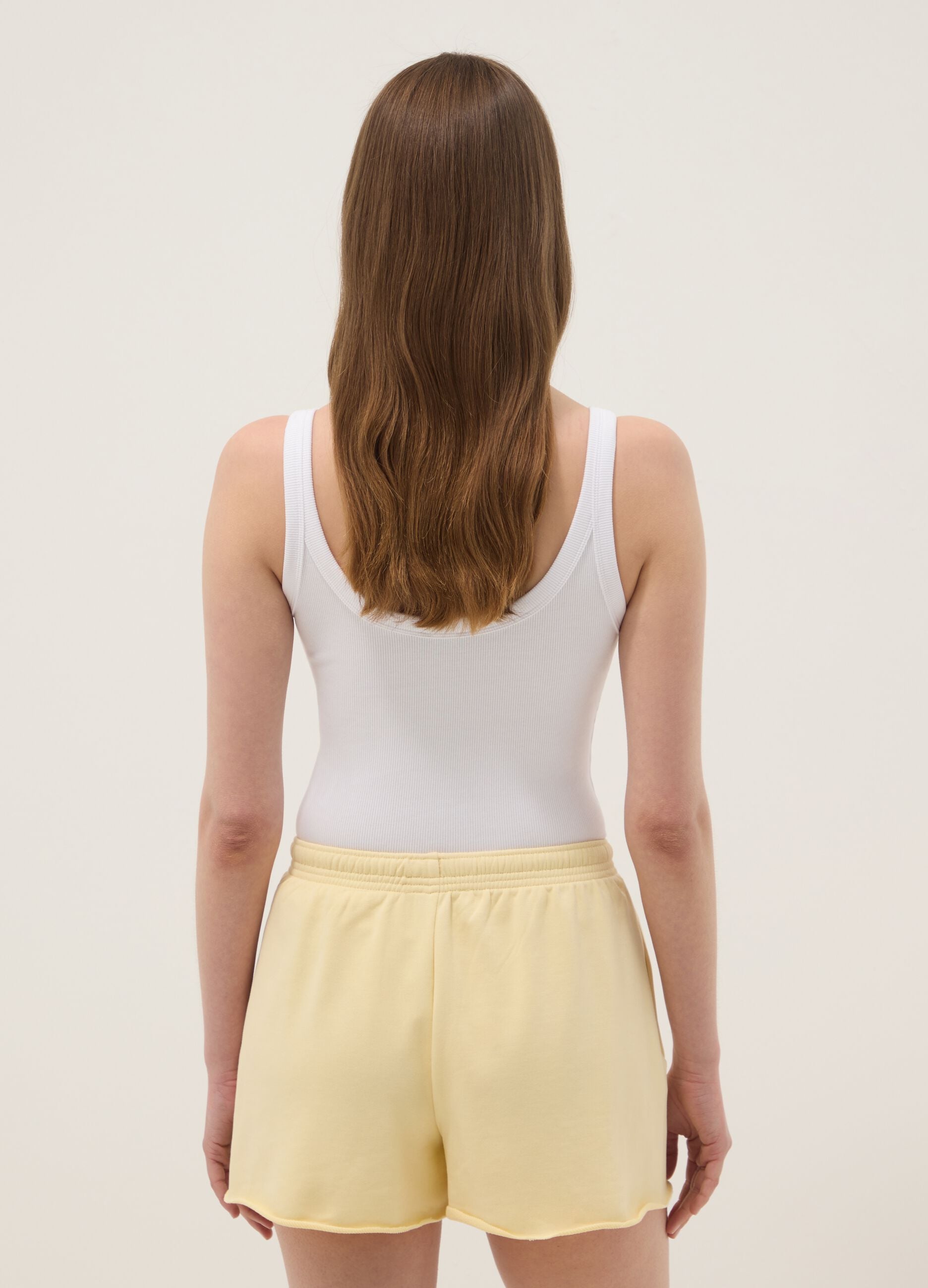 White ribbed stretch-cotton bodysuit with wide neckline