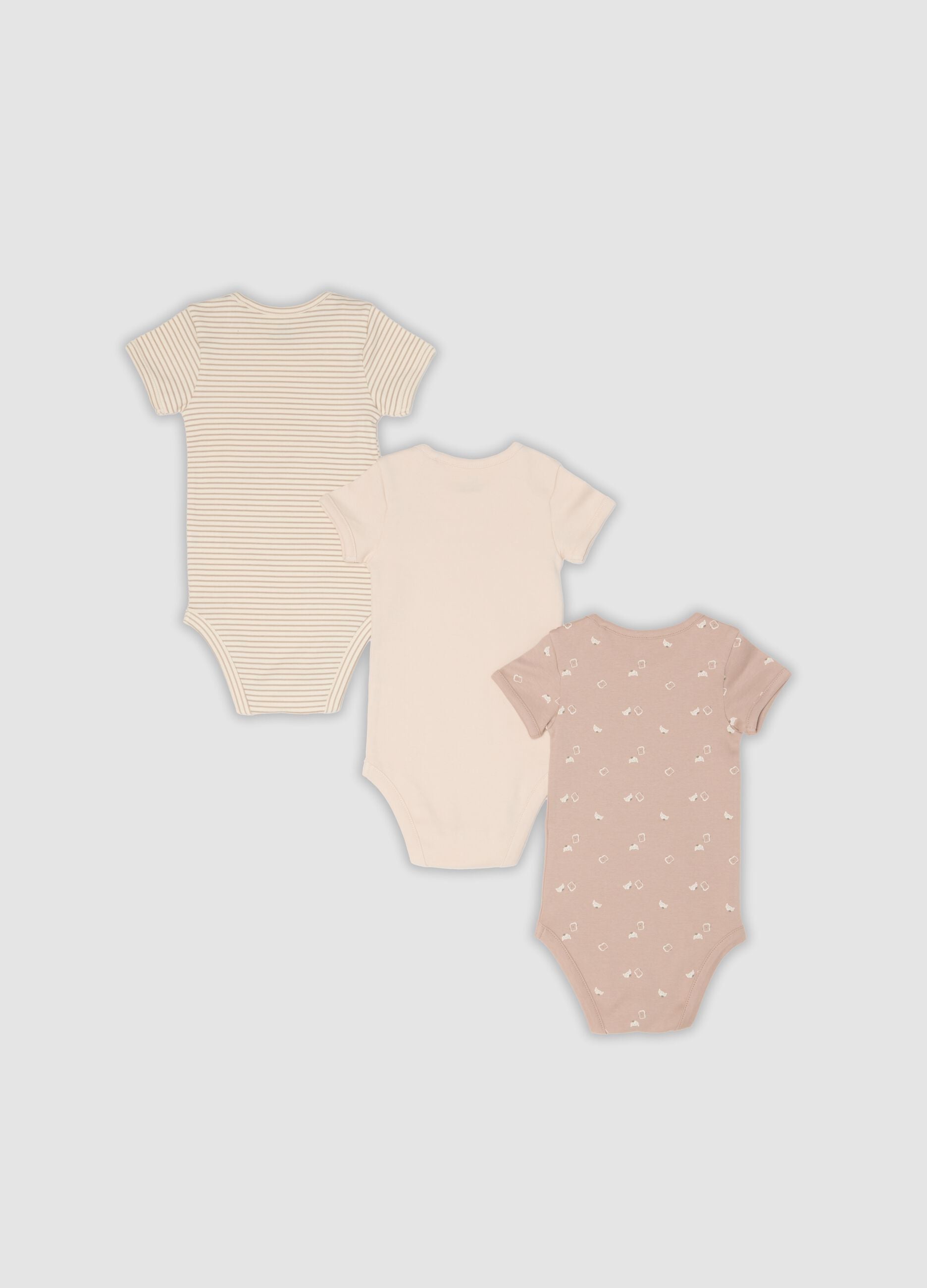 3-pack of pink and beige organic cotton short-sleeve bodysuits for babies and toddlers