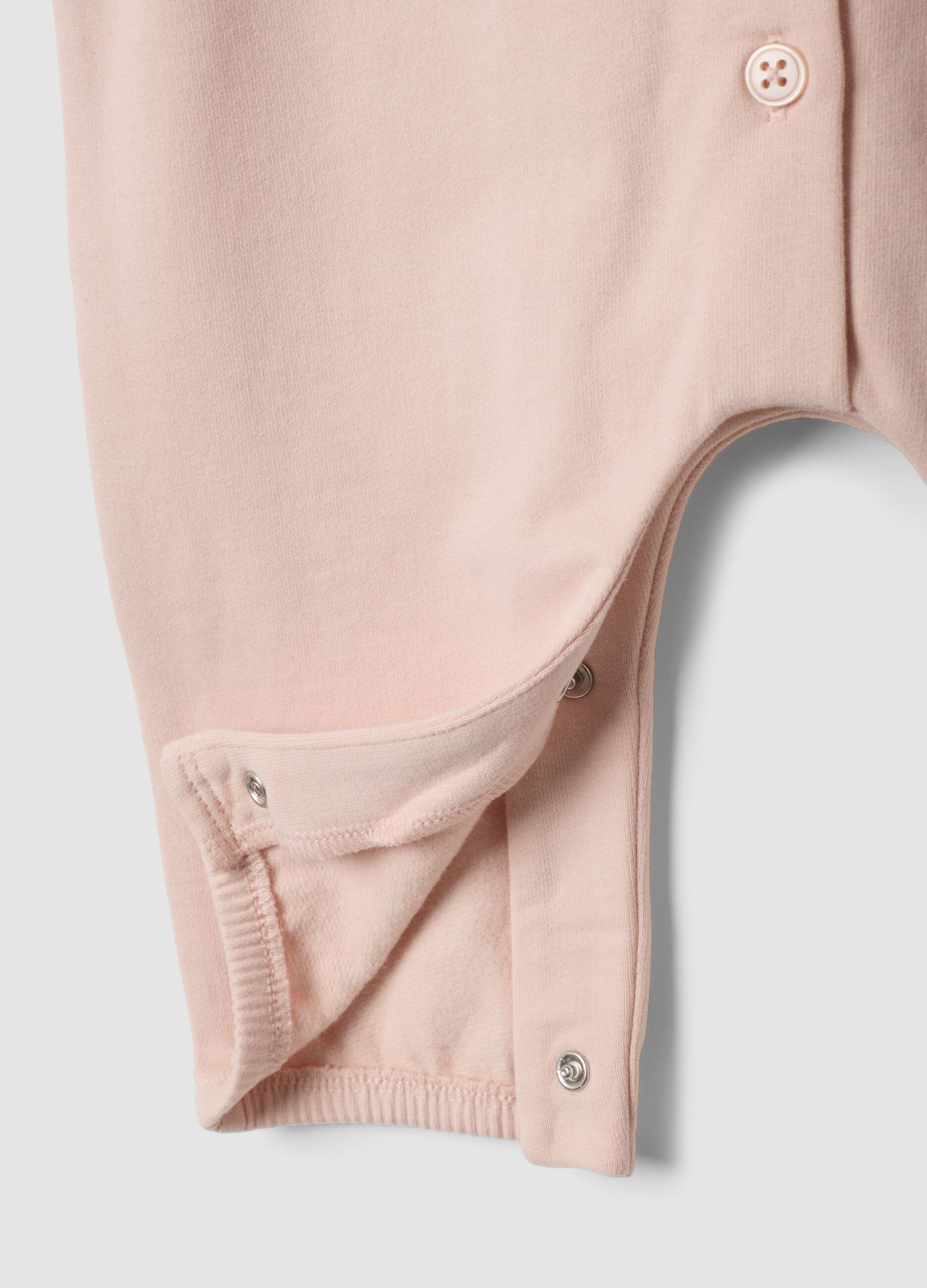 Pink organic cotton sleepsuit with ruffled collar and Minnie embroidery