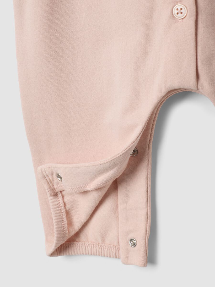 Pink organic cotton sleepsuit with ruffled collar and Minnie embroidery_3