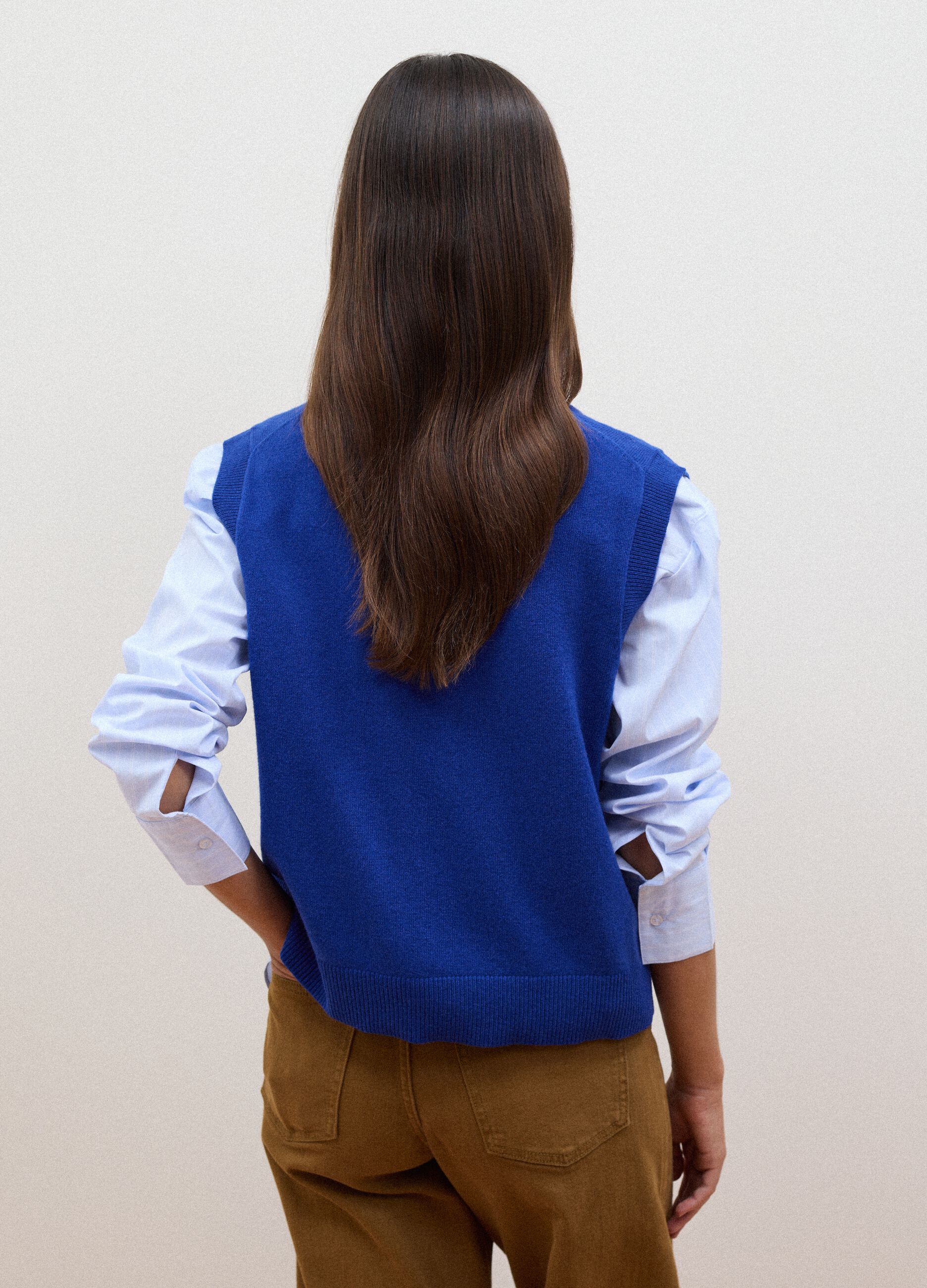 Blue pure wool gilet with deep V-neck
