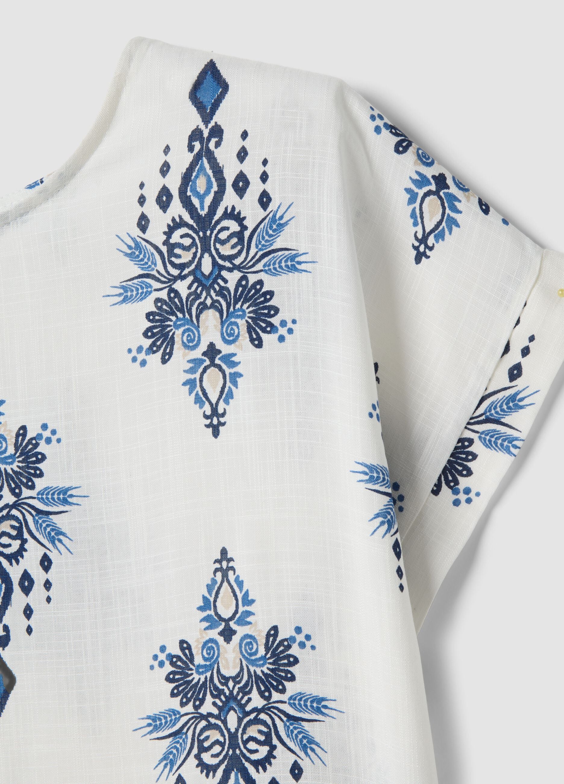 White pure viscose blouse with blue print, regular fit