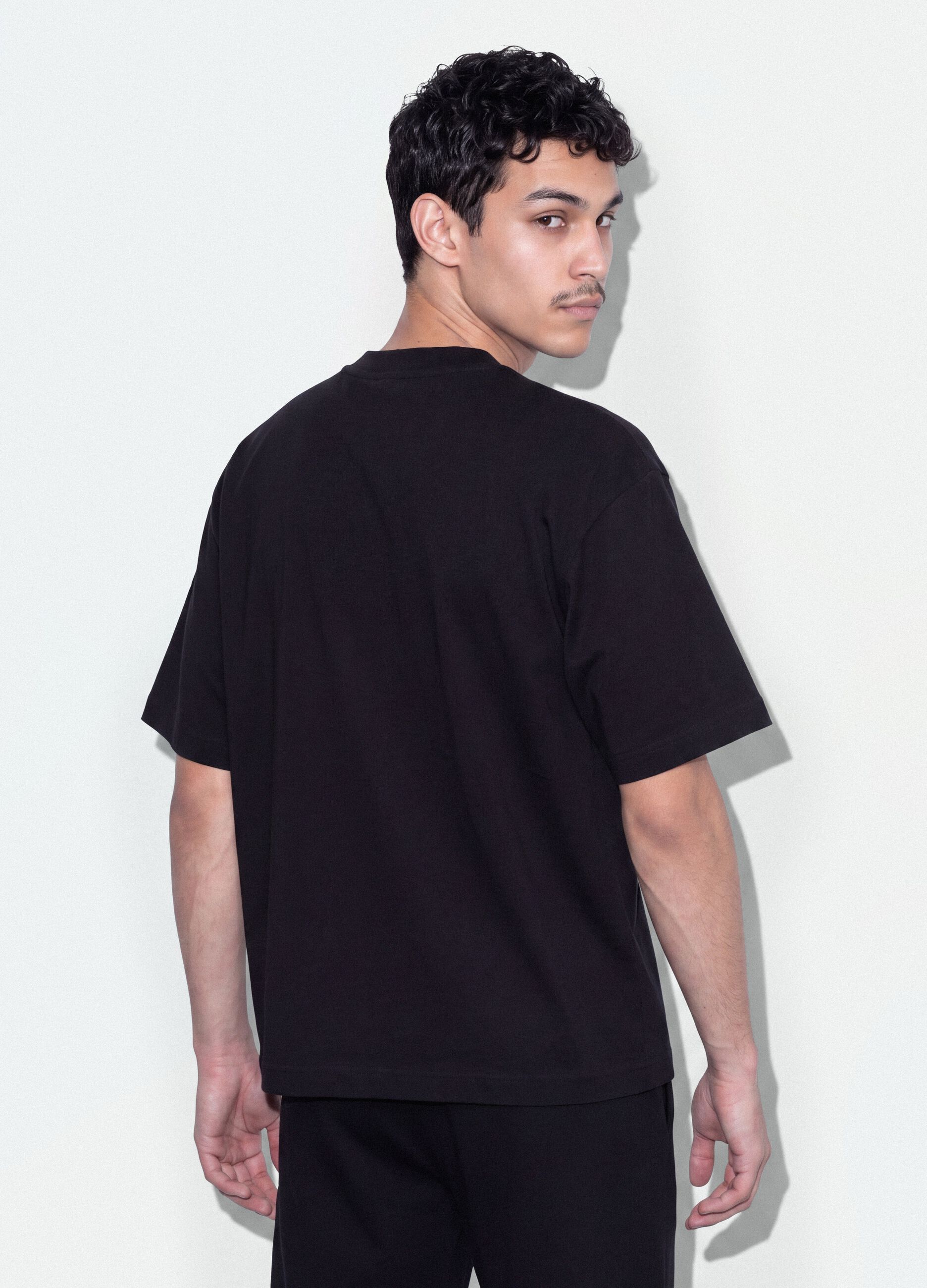 Black pure cotton crew-neck T-shirt with chest pocket, boxy fit
