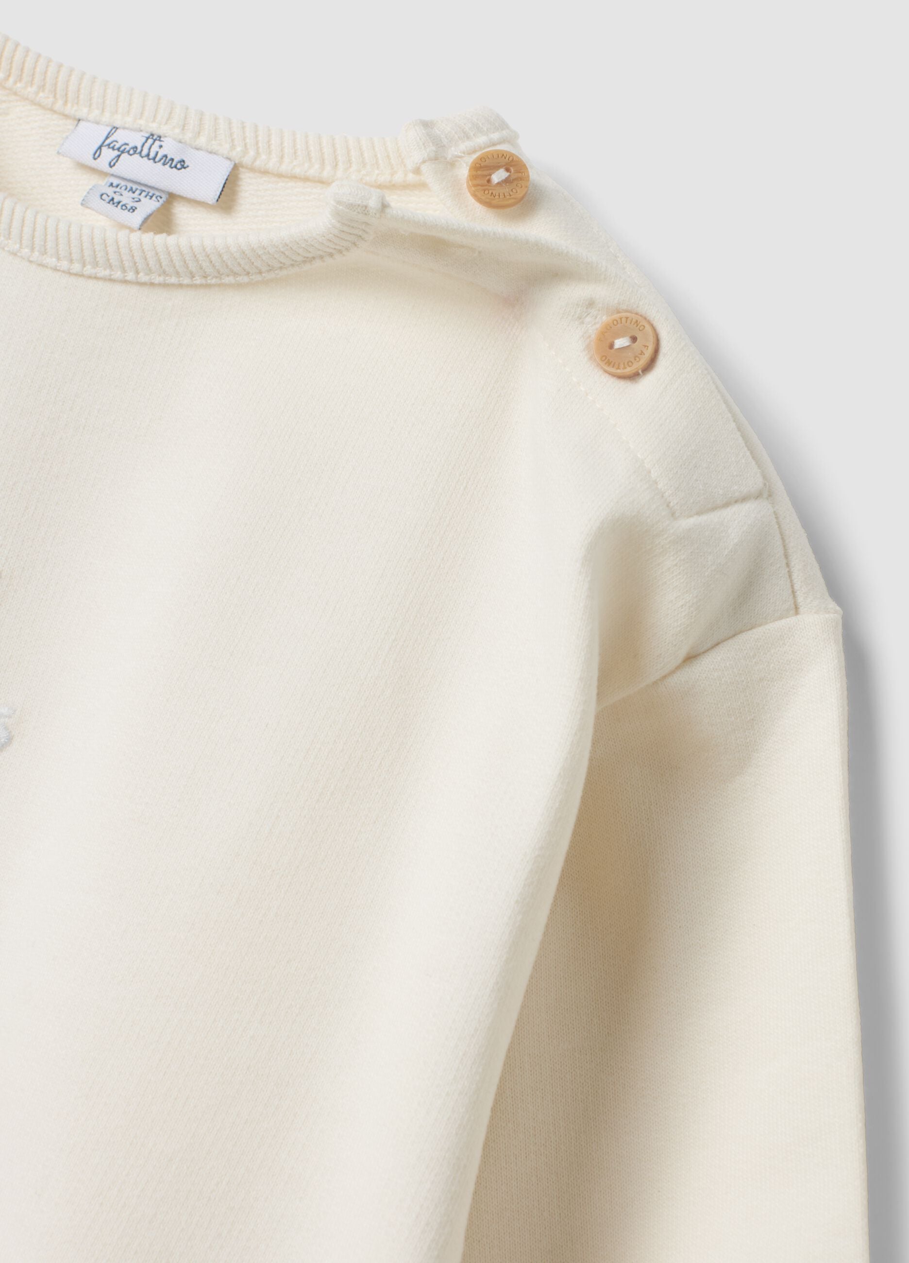 White organic cotton knit and trouser set for newborns