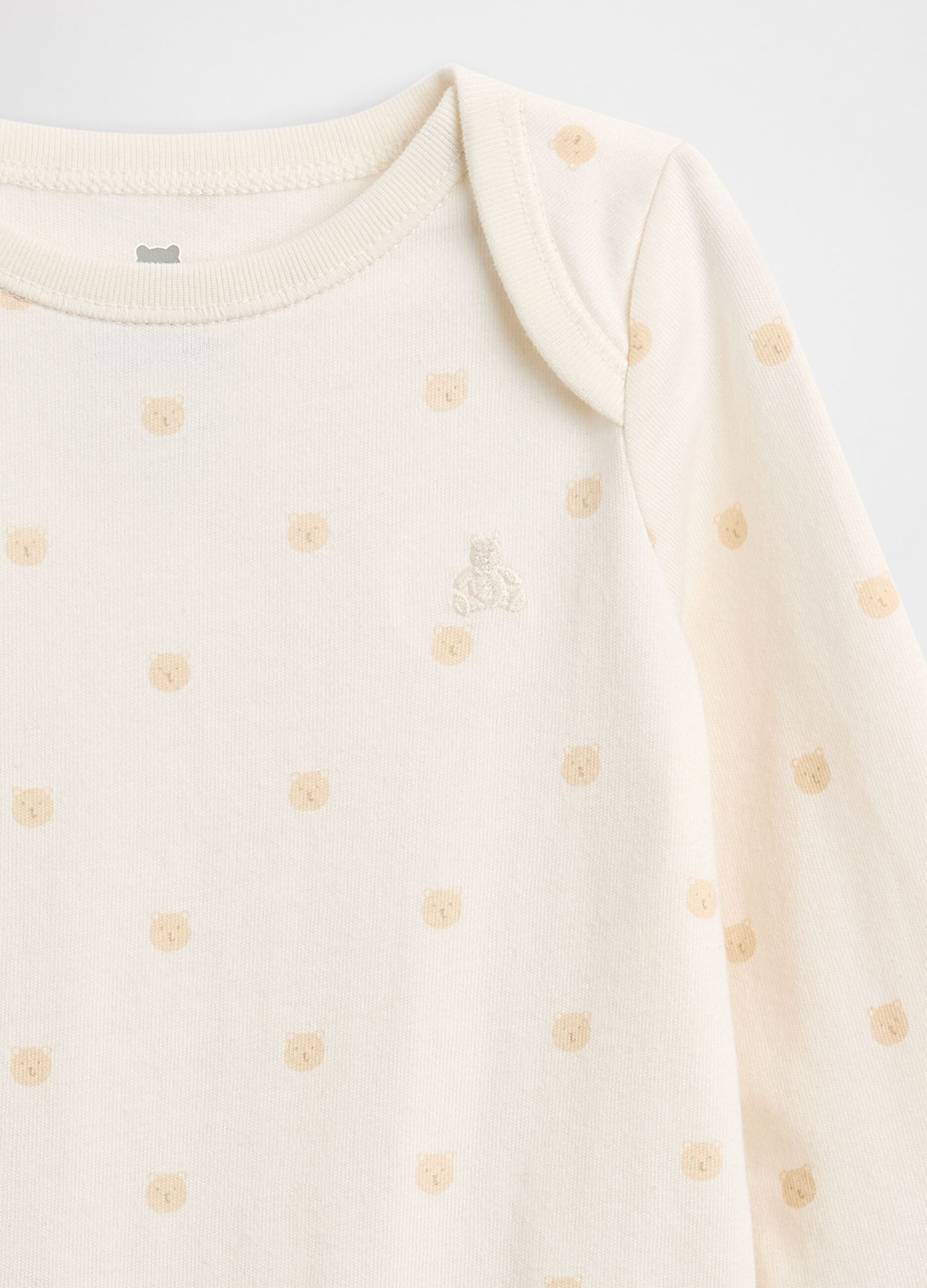 White cotton bodysuit with polka dots