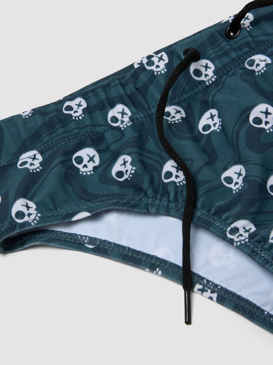 Slip mare blu in tessuto elasticizzato con stampa teschi_3