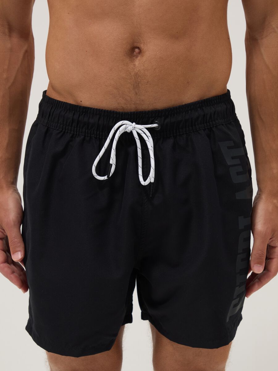 Black swim shorts with drawstring waist_1
