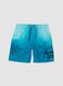 Blue tropical-print swim shorts_0