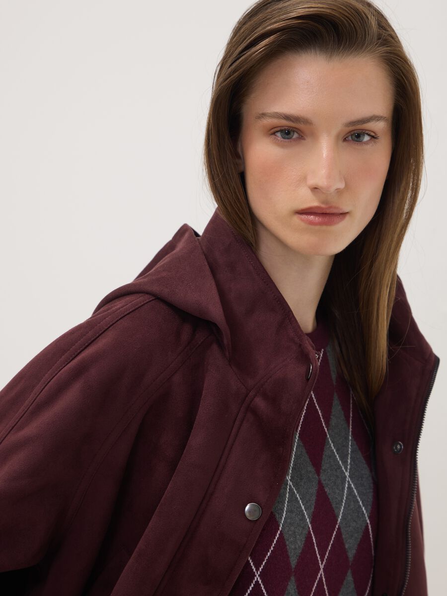Purple hooded parka with zip and press-stud fastening_0