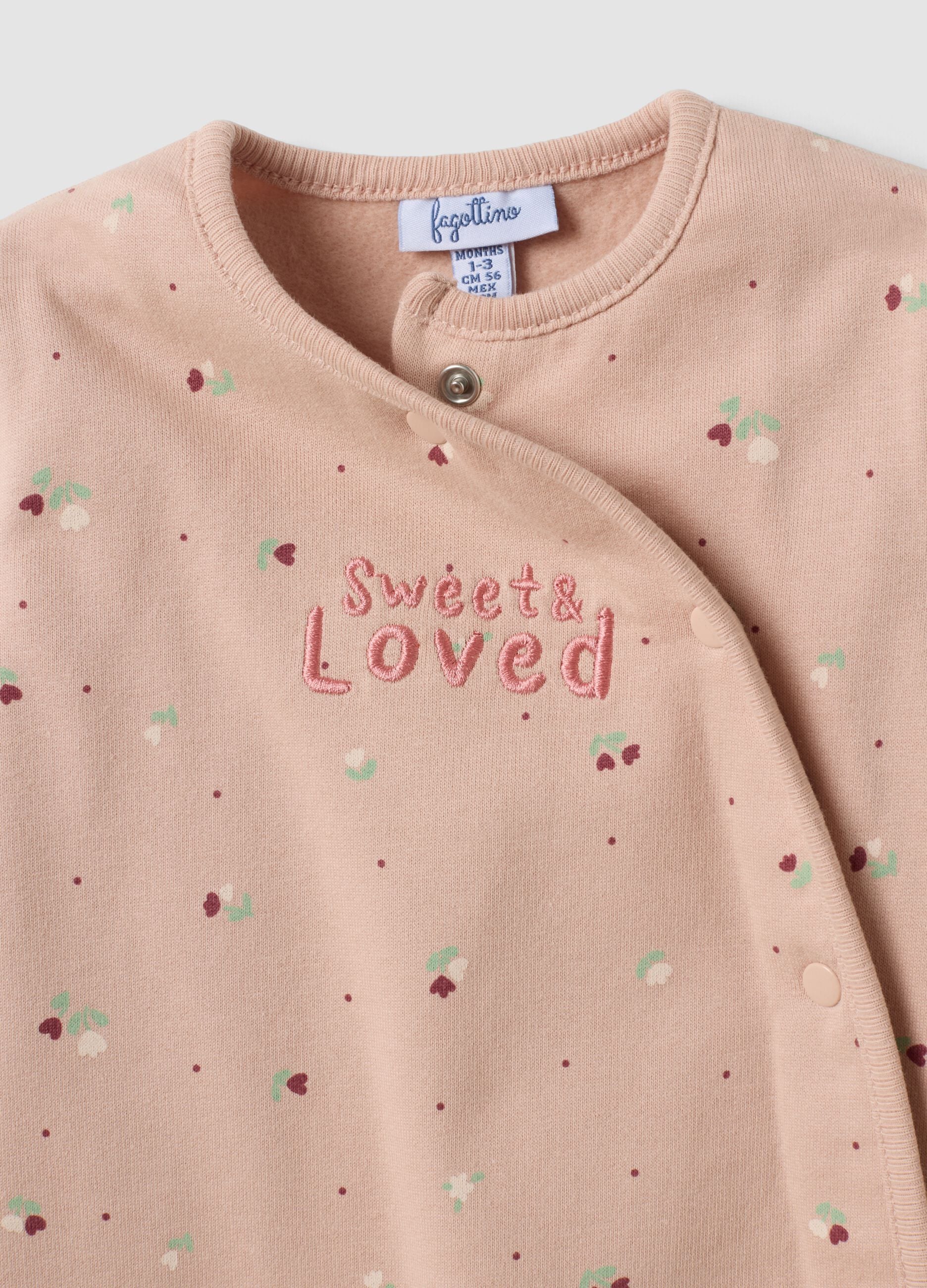 Pink organic cotton floral sleepsuit for baby girl