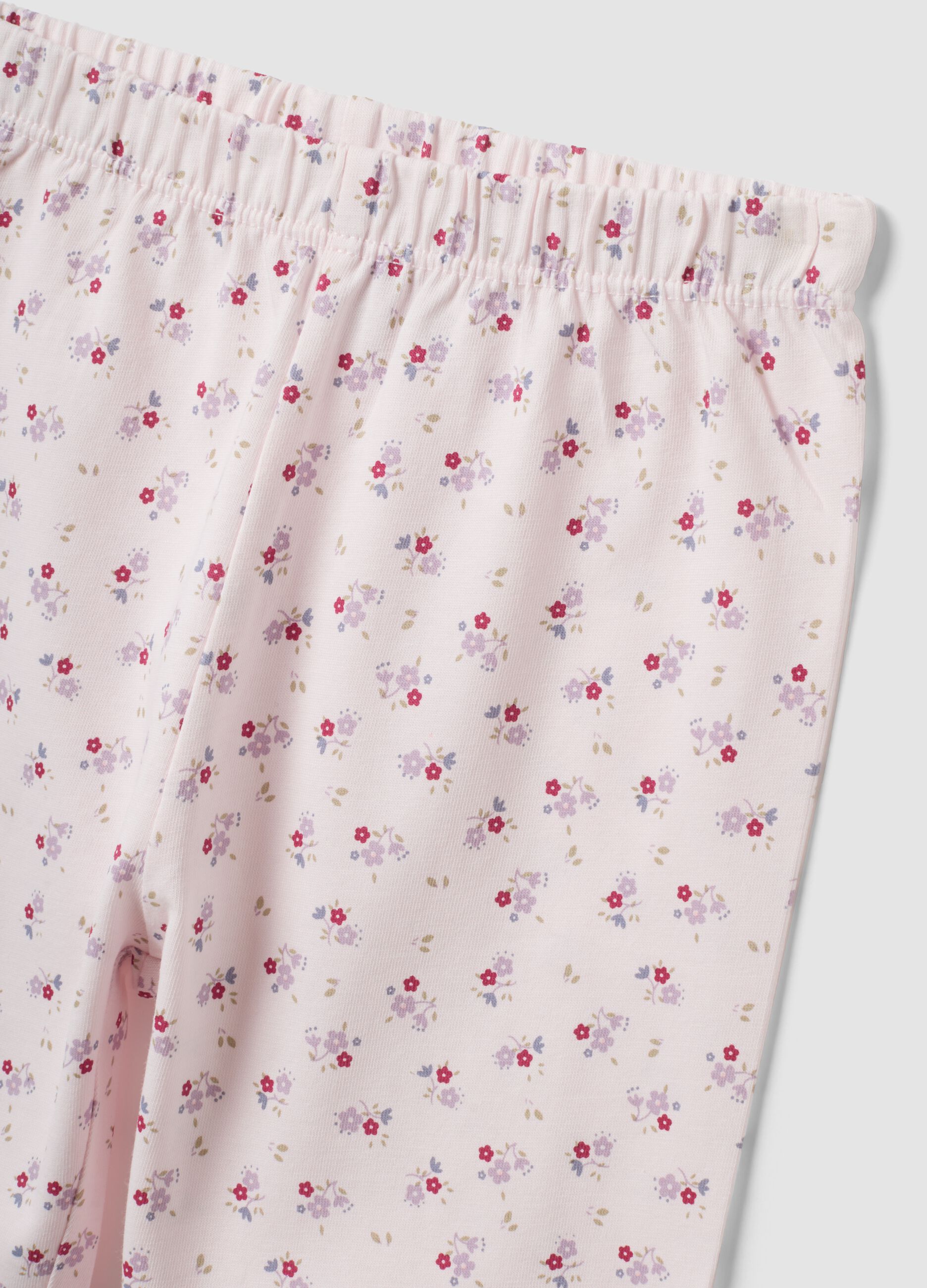 Pink organic cotton jersey pyjamas with floral print for baby girls and girls