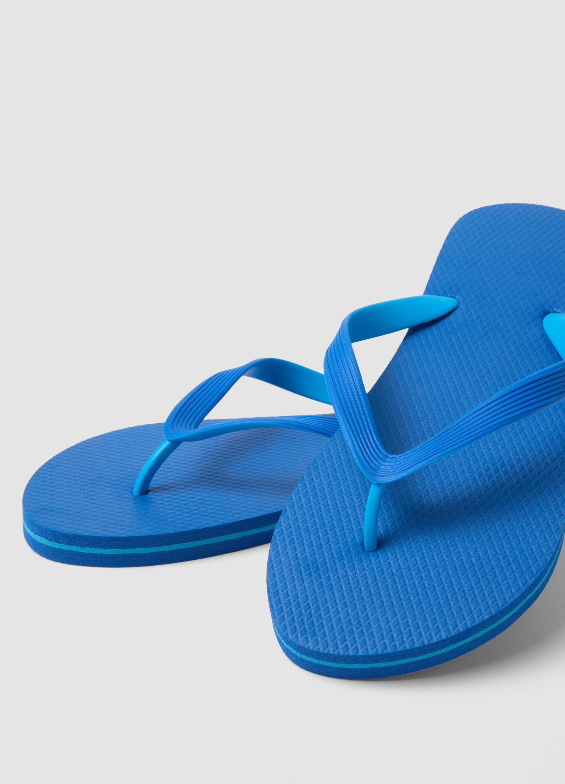 Blue flip-flops for the beach