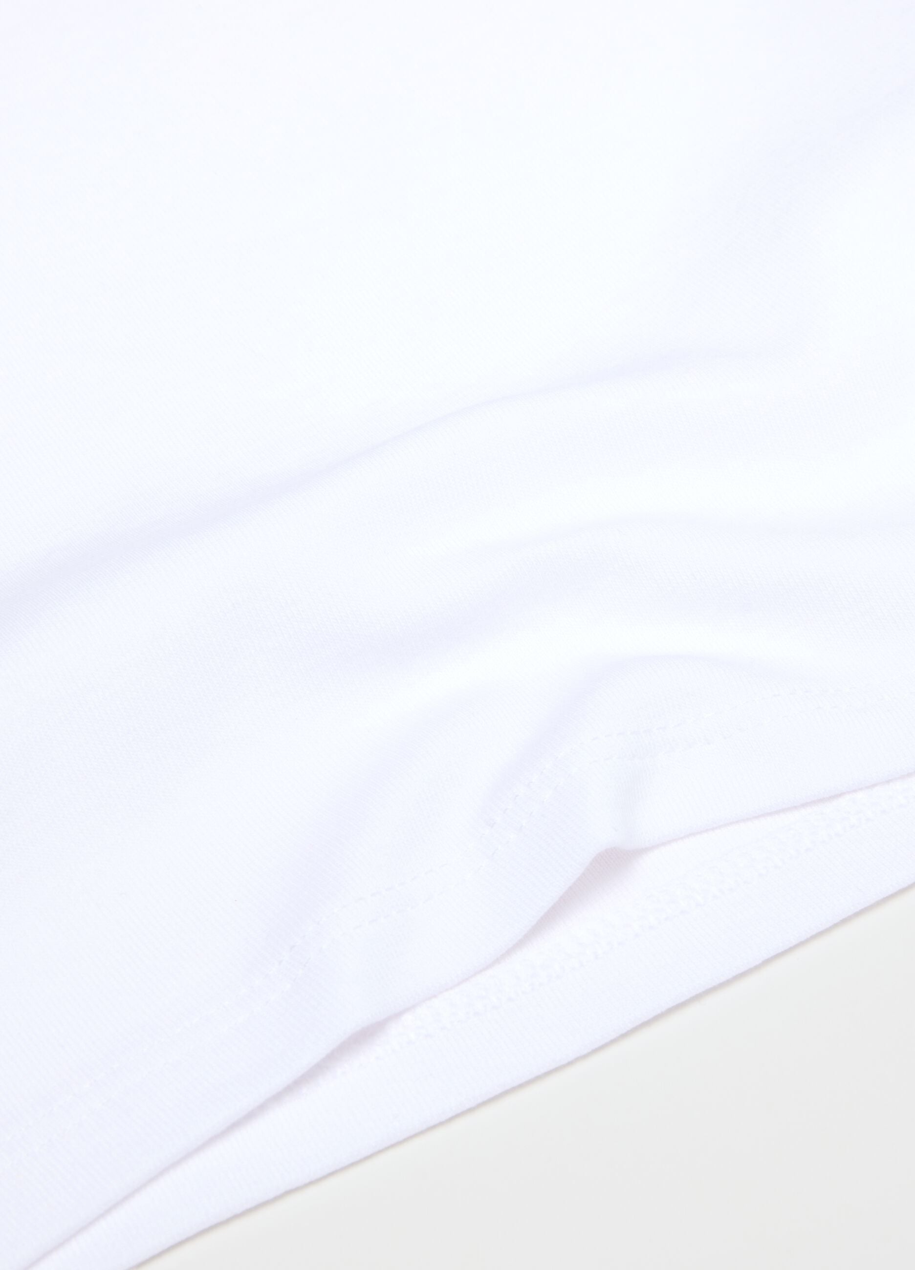 Twin pack of white girls' vests in pure cotton regular fit