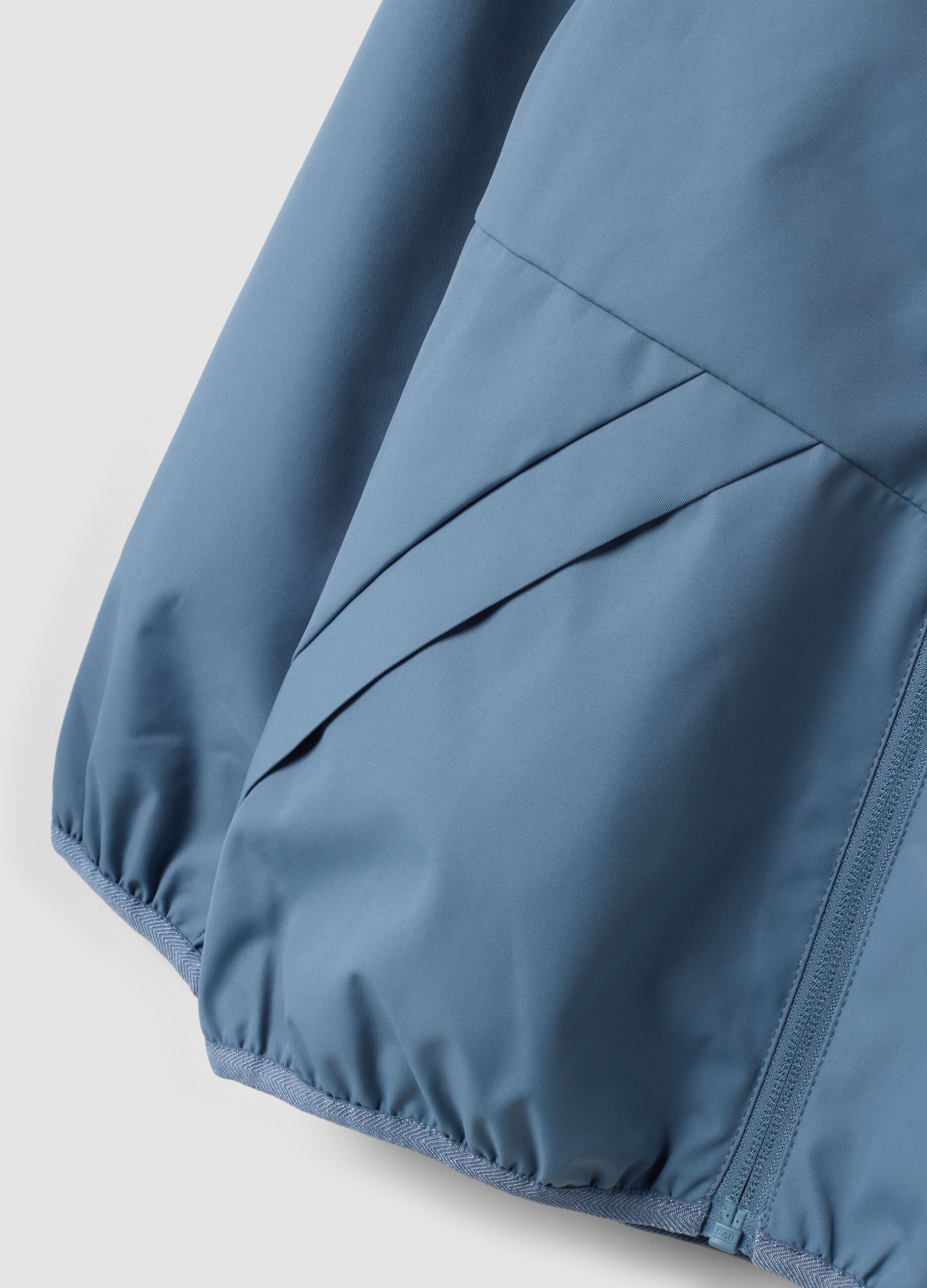 Light blue oversized hooded zip-up jacket for boys