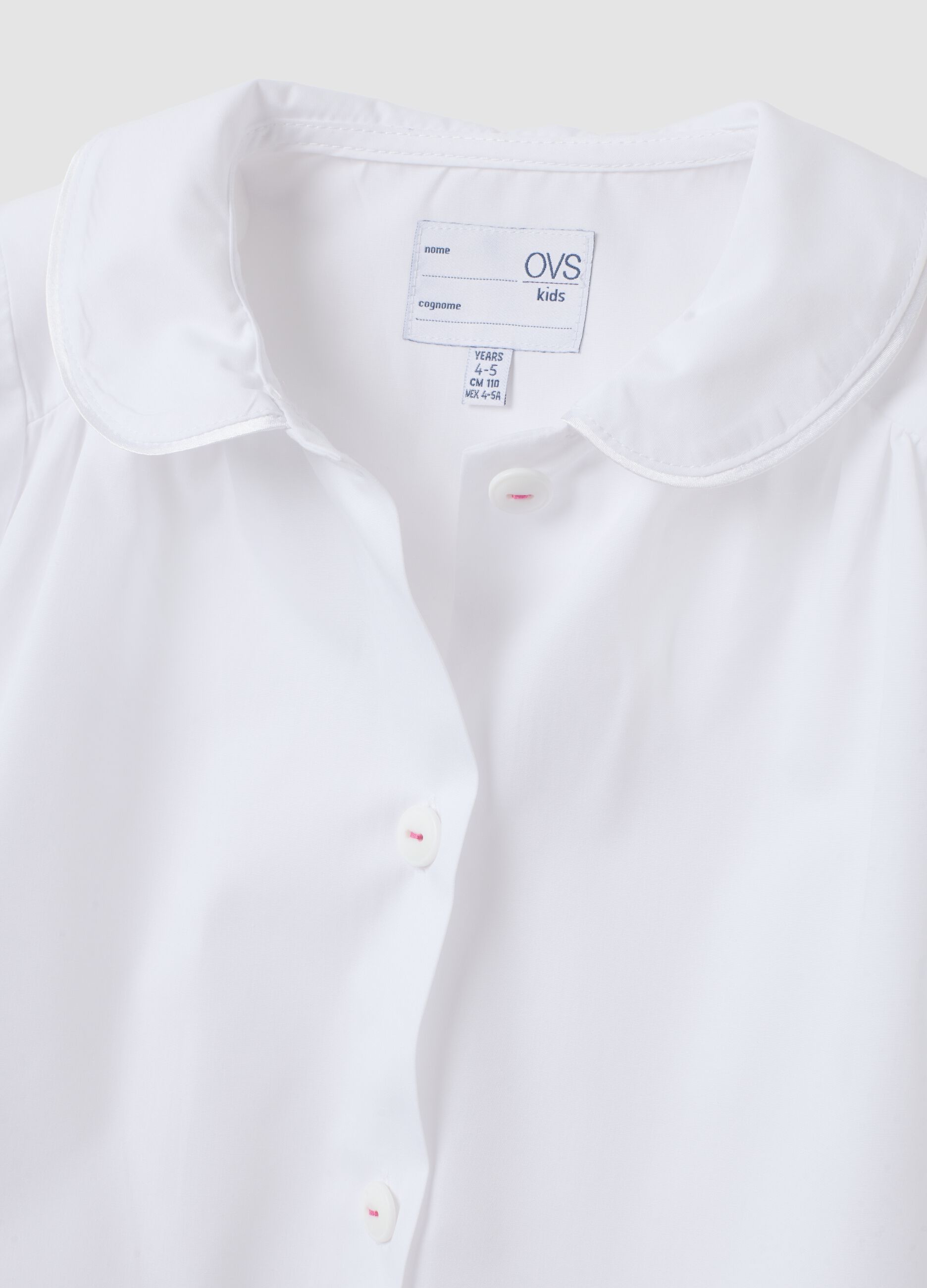 2-pack of white nursery school aprons with classic collar