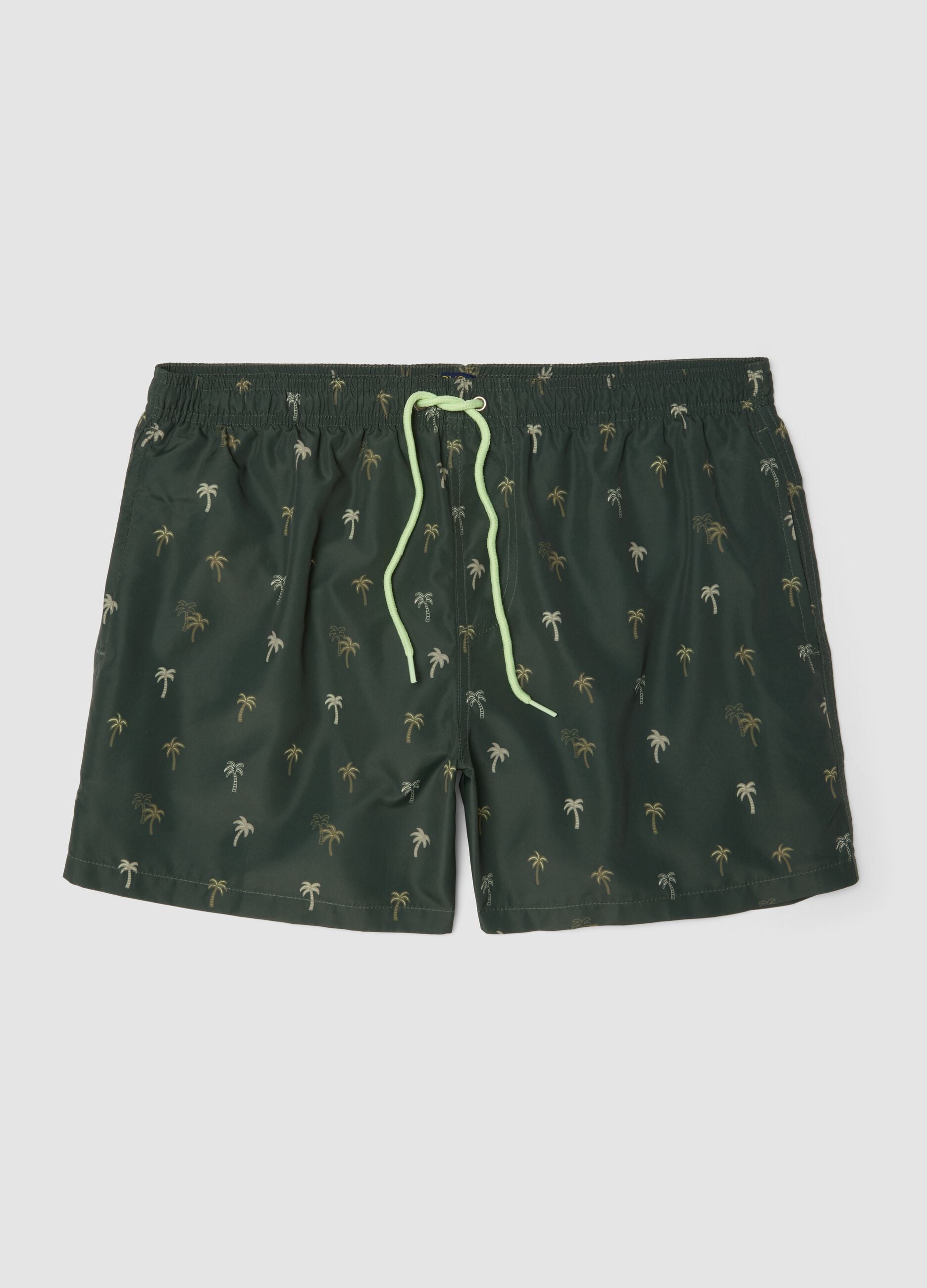 Green boxer swim shorts with palm print