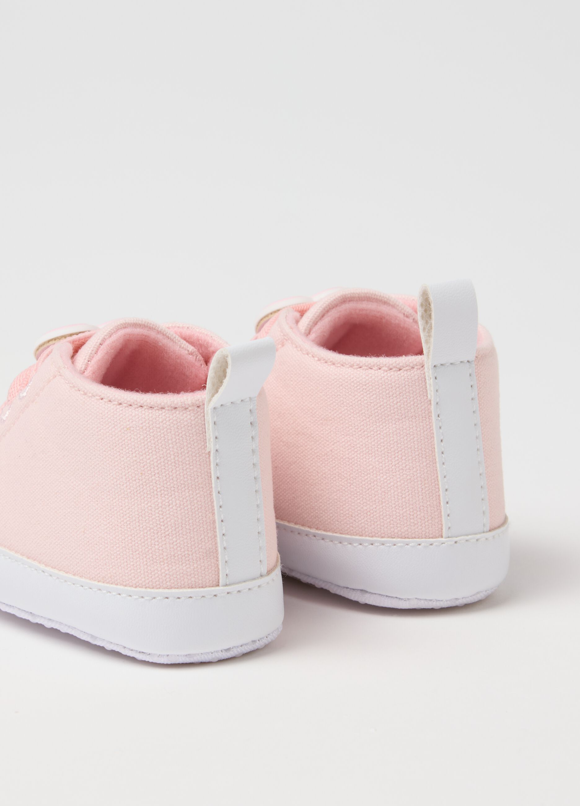 Pink canvas booties for newborn girl