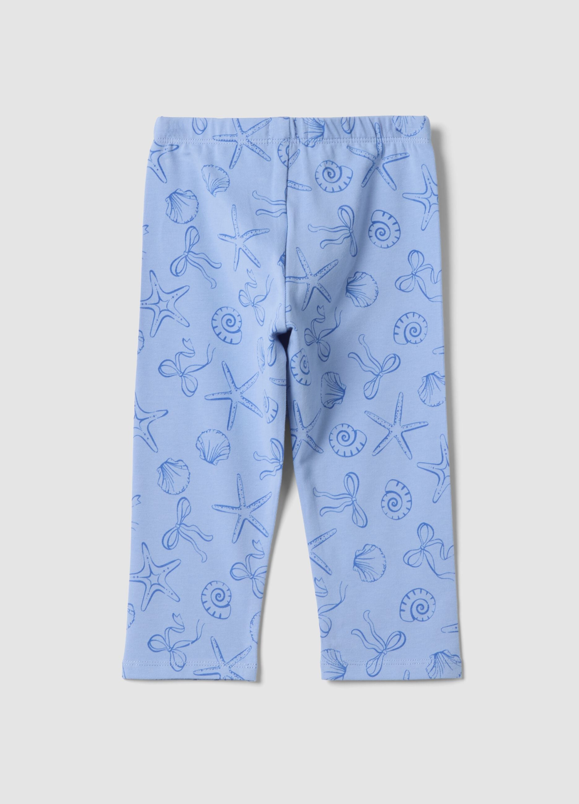 Girls&rsquo; light blue skinny stretch cotton leggings with print