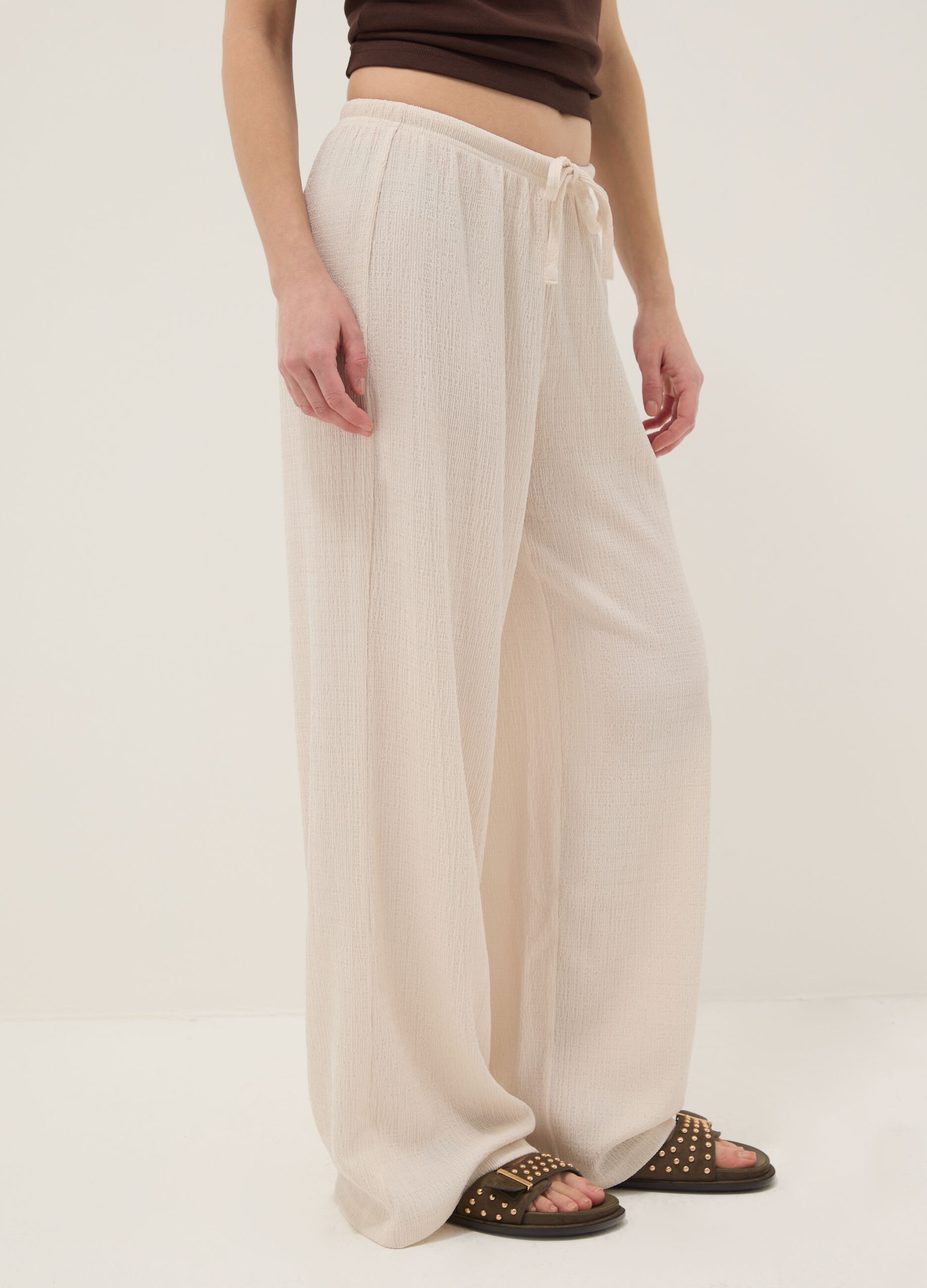 Beige wide leg jogger trousers