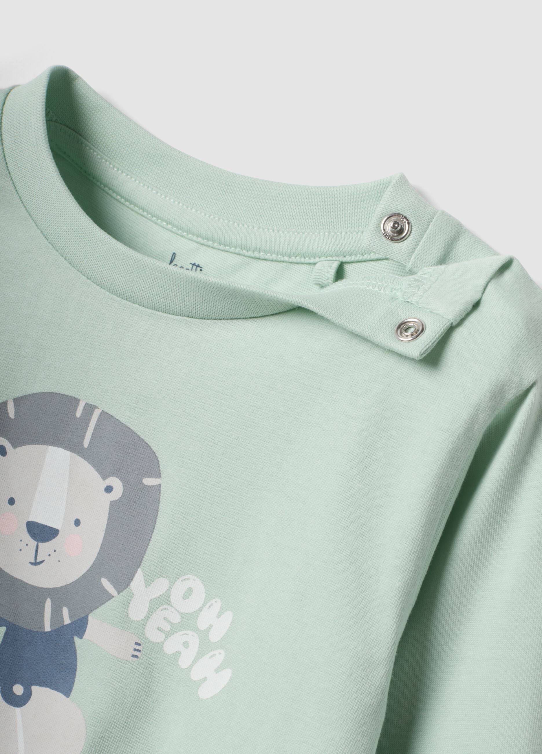 Green long printed organic cotton jersey pyjamas for babies and toddlers