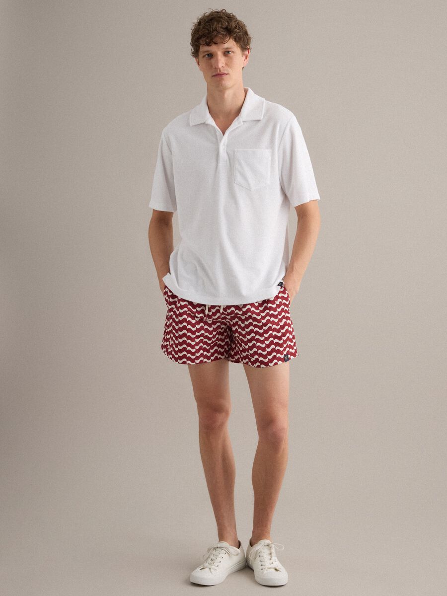 Red men&rsquo;s swim shorts with all-over print_0