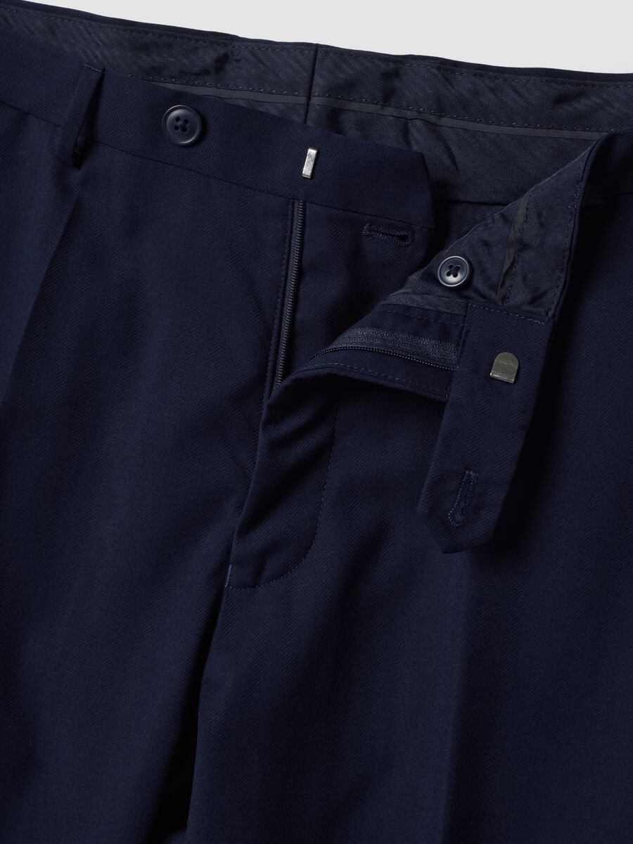 Pantaloni blu in viscosa elasticizzata slim fit_1