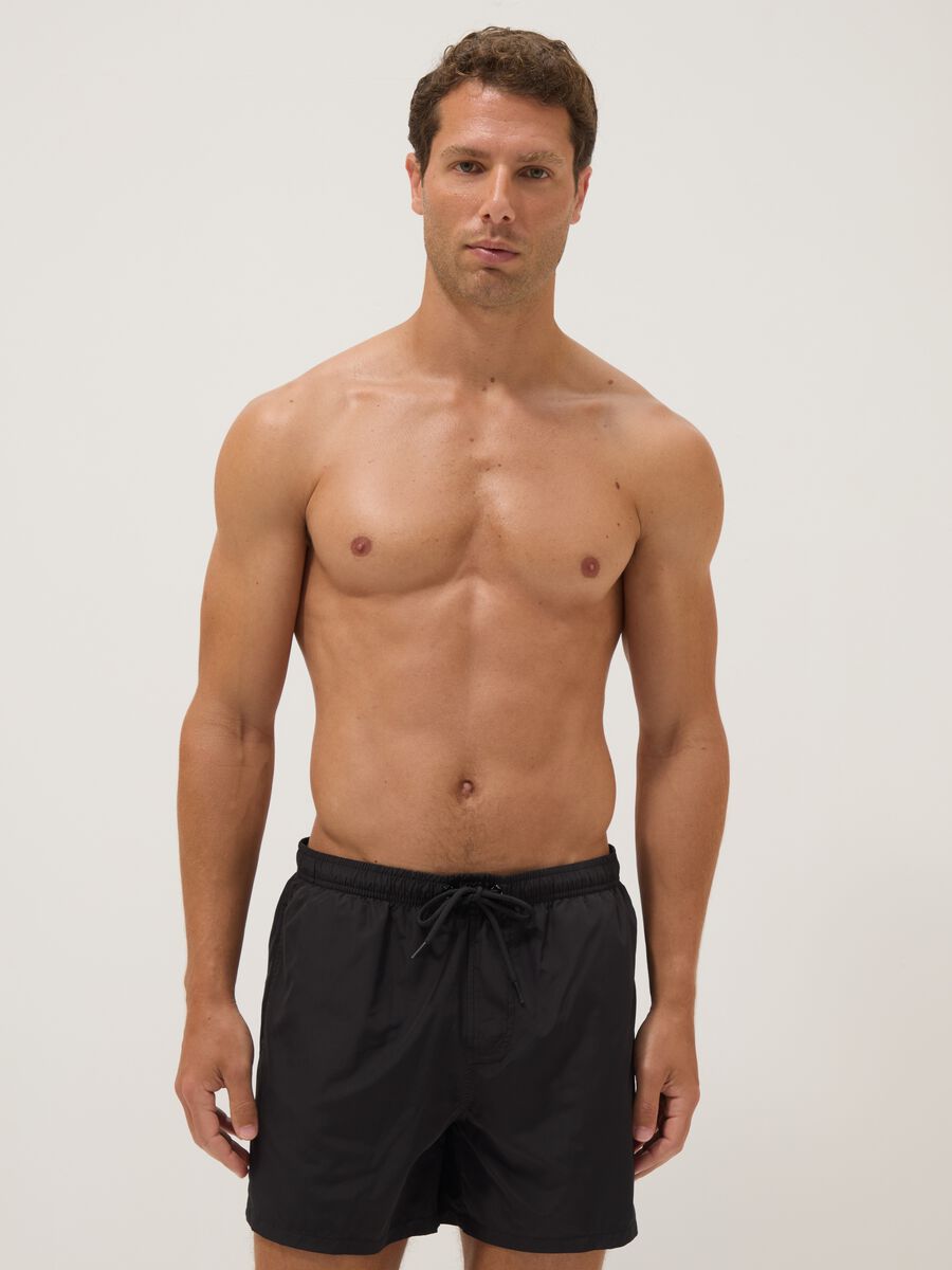 Black swim shorts with elasticated waistband_0