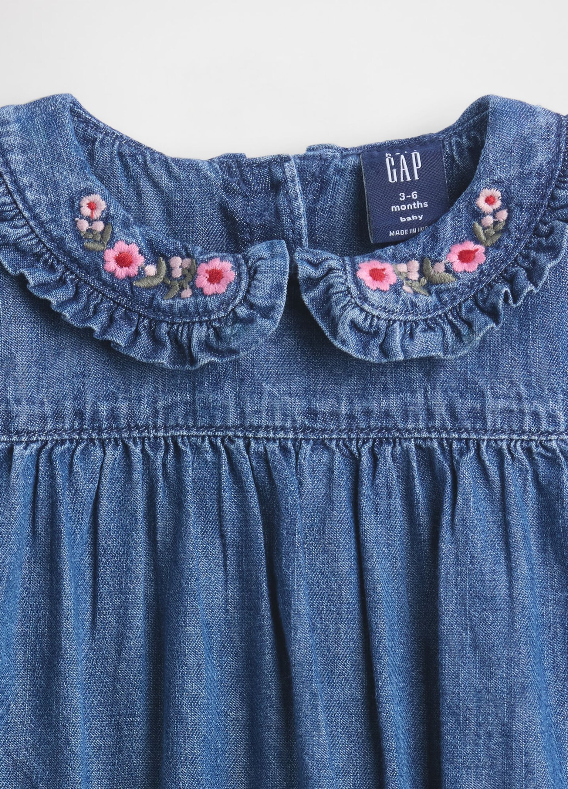 Denim bodysuit with embroidered collar