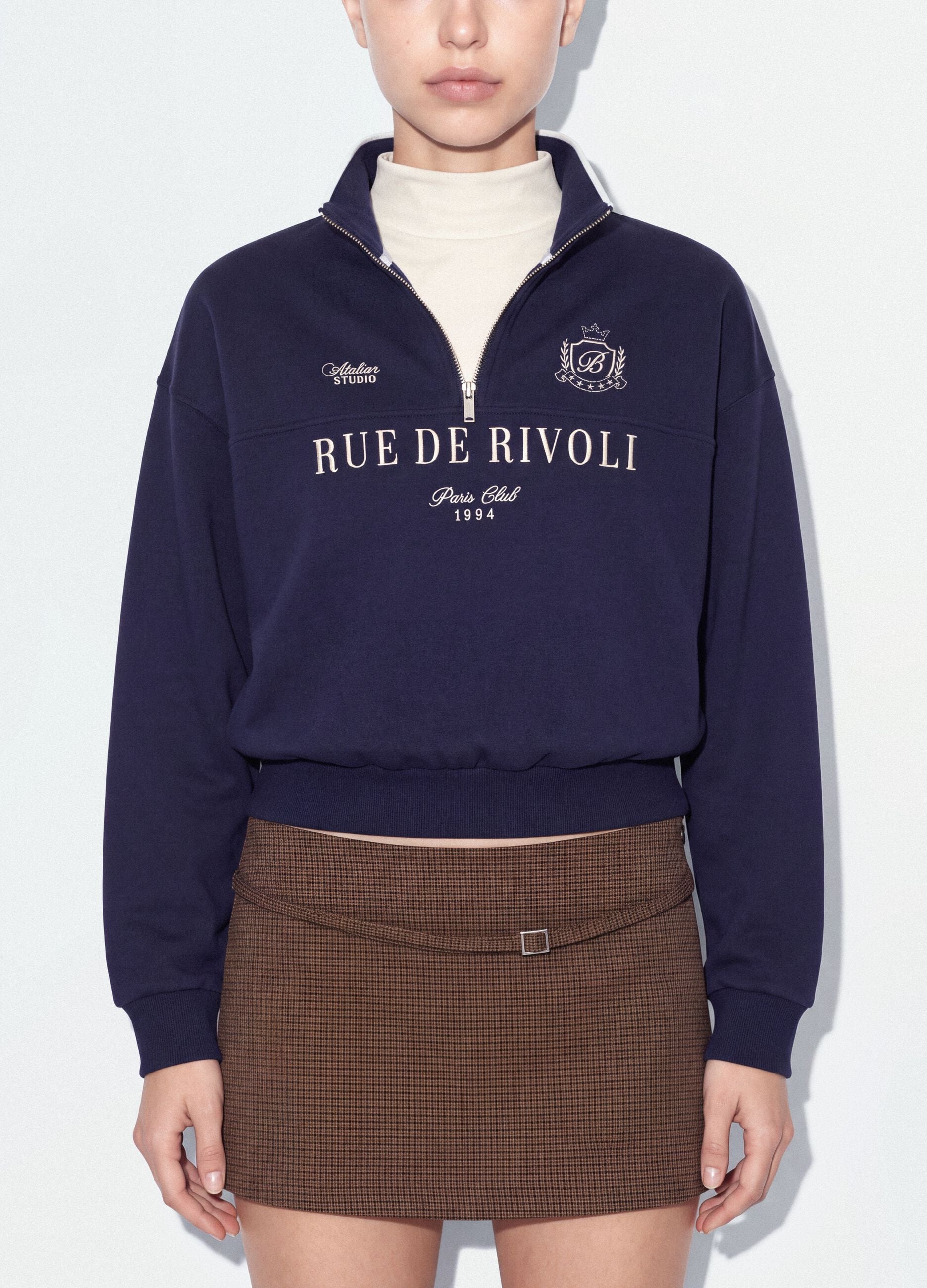 Blue half‑zip cotton‑blend sweatshirt with front lettering, regular fit